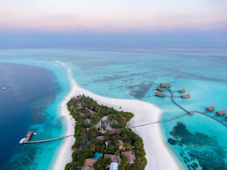 Discovery Maldives Water Bungalows Above Coral Reef Lagoon